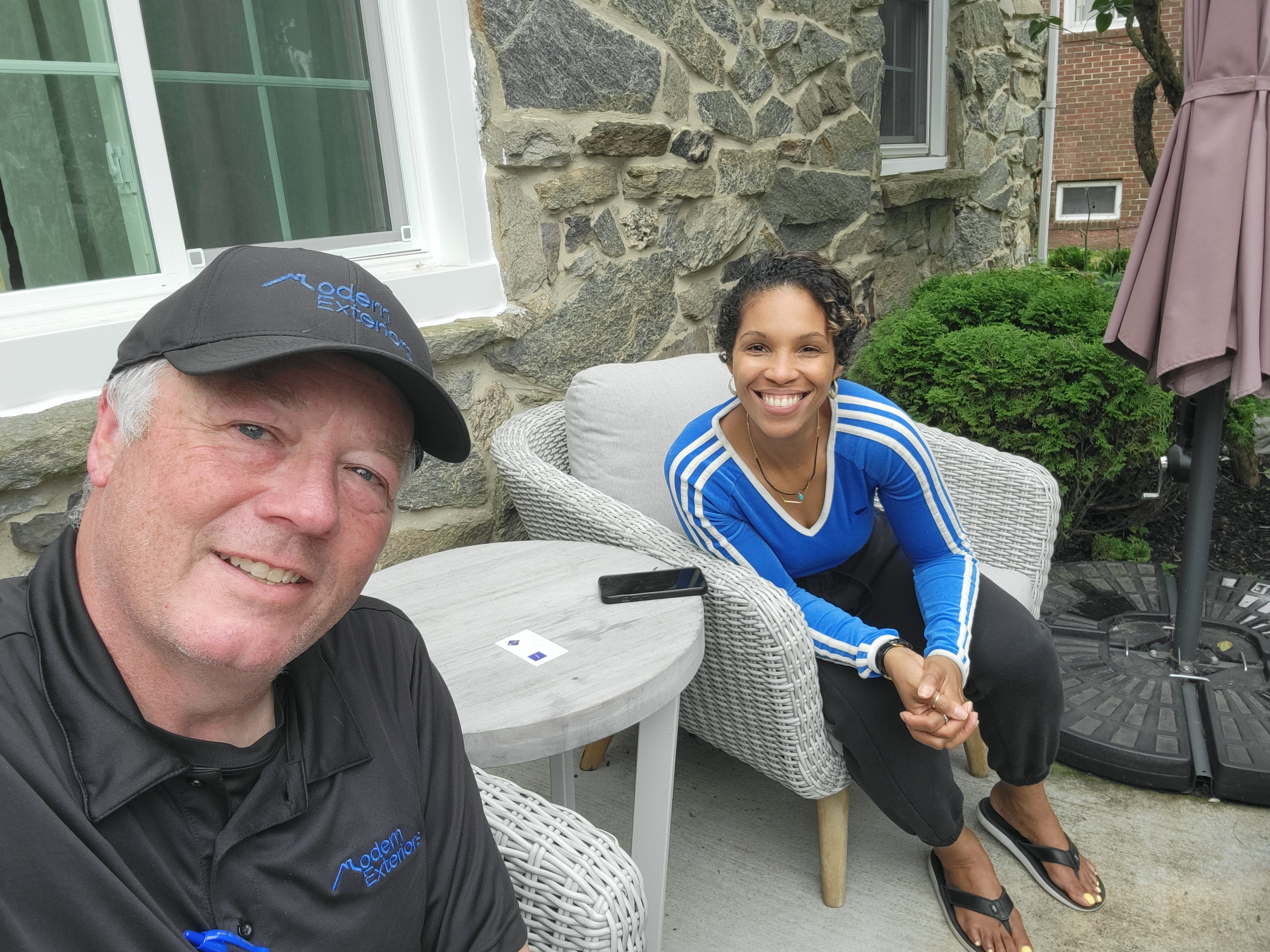 Modern Exteriors team member at a customer's home