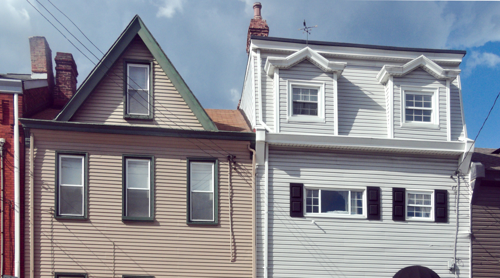 Vinyl siding panels on a house exterior showing horizontal panel lines